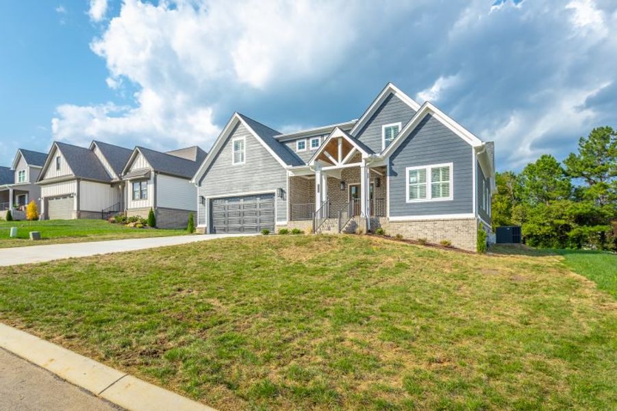 Representative exterior photo of a completed home built from the Autumnbrook C by Riverstone Construction, LLC in Faith View, Ooltewah, TN (Image 22). Representative exterior photo of a completed home built from the Autumnbrook C by Riverstone Construction, LLC in Faith View, Ooltewah, TN (Image 22).