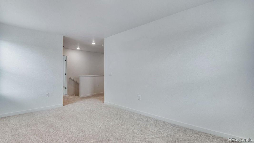 Spacious, unfurnished interior of a new home in Trails at Crowfoot, Parker (Image 33).