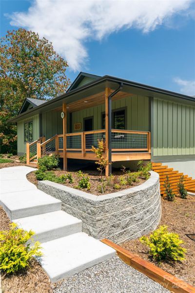 Front exterior of a new home in , Weaverville, NC, highlighting curb appeal (Image 26).