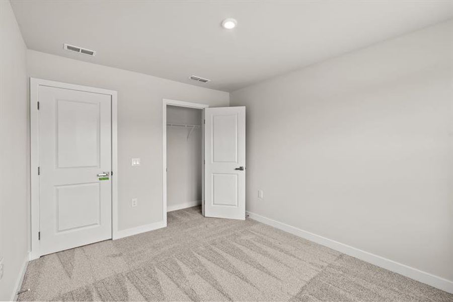 Spacious, unfurnished interior of a new home in Lakes at Riverbend, Navassa (Image 17).