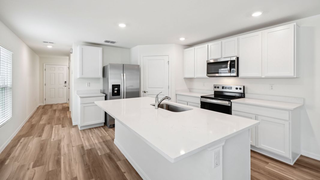 Representative furnished interior of a home built from the HARPER by D.R. Horton in Sherman Oaks, Brooksville (Image 14).
