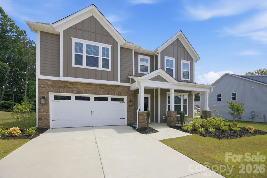 Front exterior of a new home in Glenhurst, Indian Trail, NC, highlighting curb appeal (Image 23).