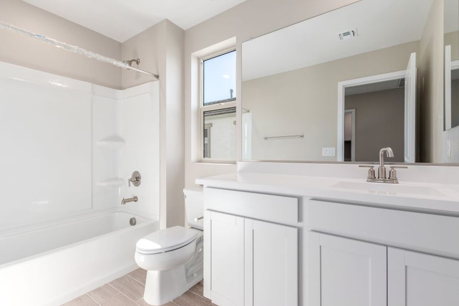 Furnished interior view inside a new home in Solvida at Estrella, Goodyear (Image 12).