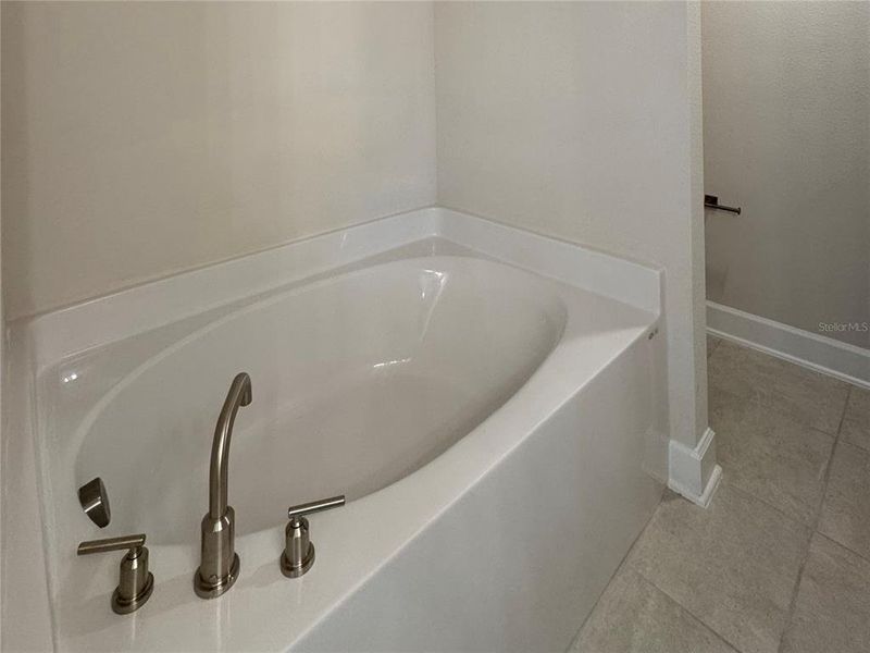 Furnished interior view inside a new home in Harmony Central, Harmony (Image 6).