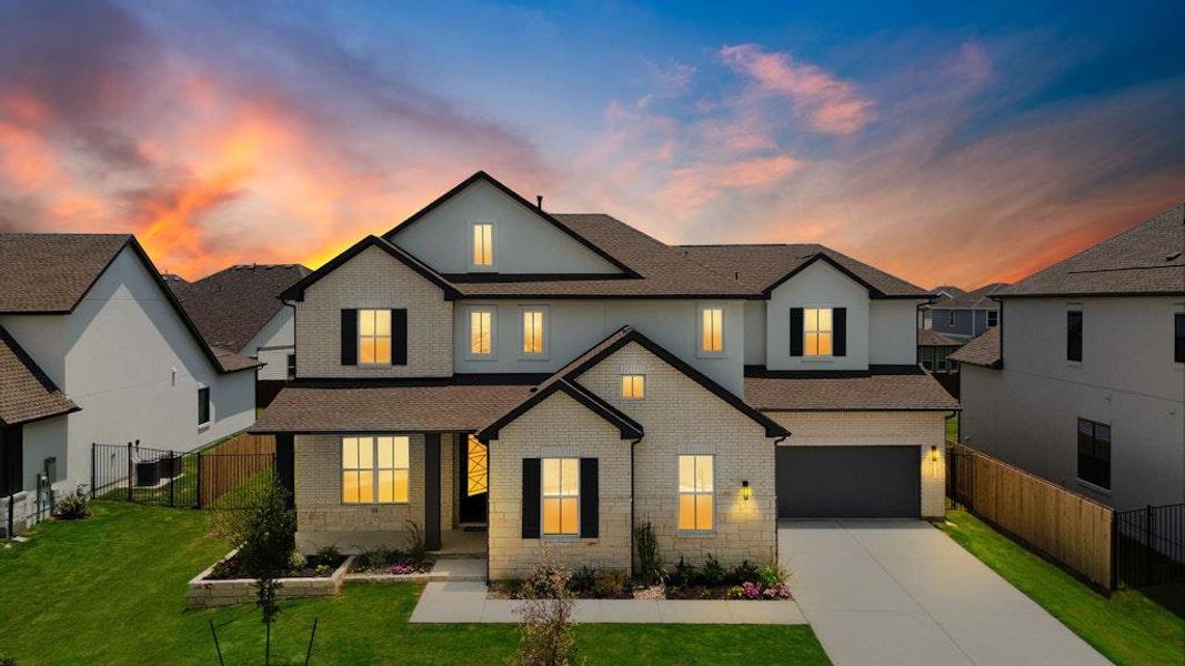 Front exterior of a new home in Santa Rita Ranch, Liberty Hill, TX, highlighting curb appeal (Image 20).