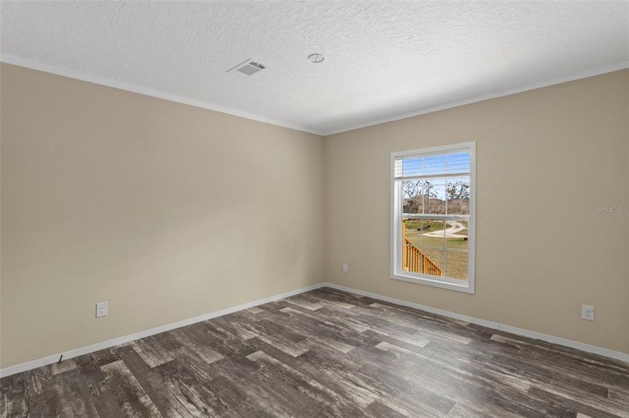 Spacious, unfurnished interior of a new home in , Dade City (Image 38).