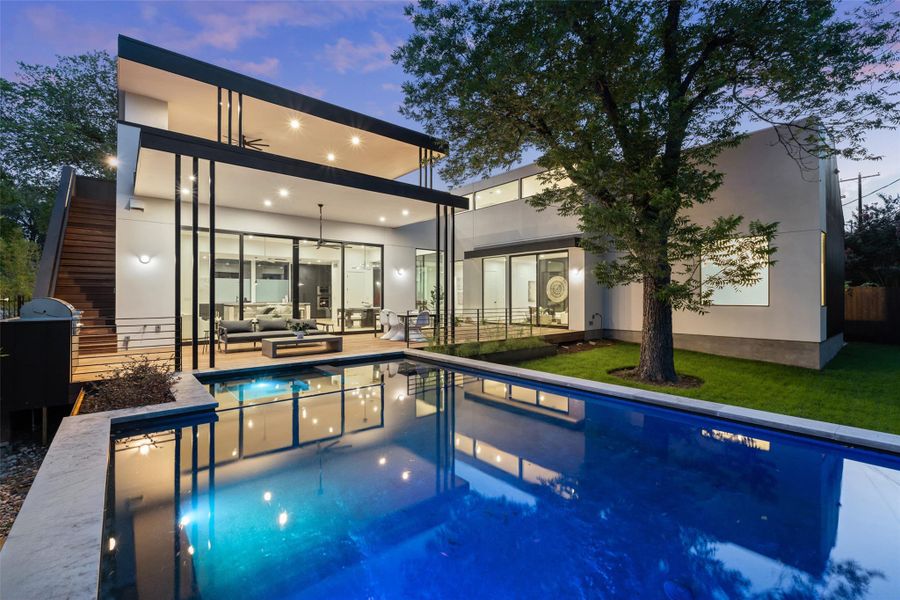 Back of house featuring outdoor lounge area, an outdoor pool, ceiling fan, and a patio Back of house featuring outdoor lounge area, an outdoor pool, ceiling fan, and a patio