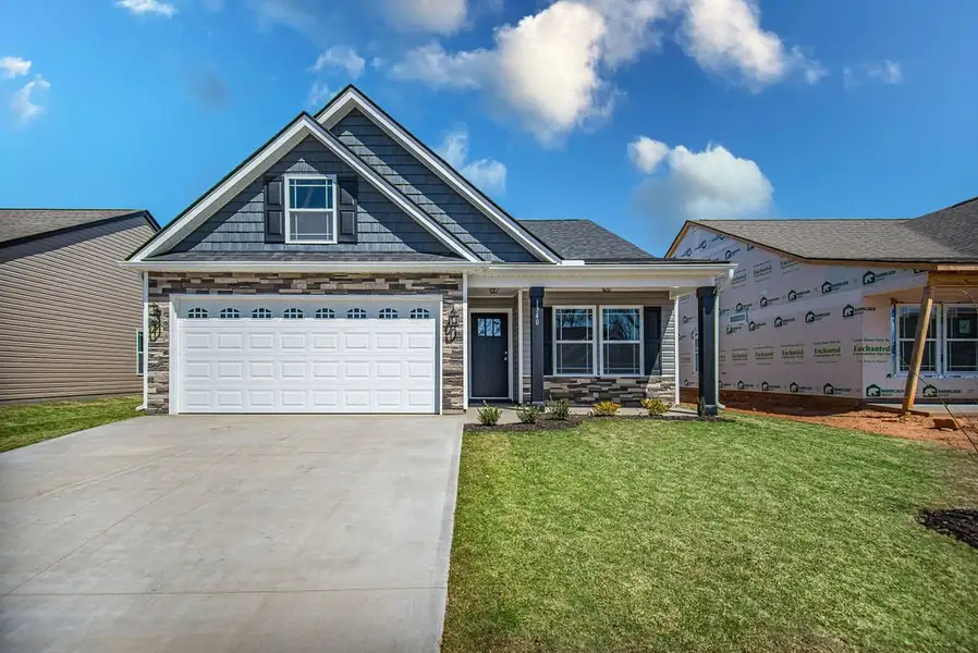 Representative exterior photo of a completed home built from the Bishop by Enchanted Homes in Ballentine Ridge, Lyman, SC (Image 1).
