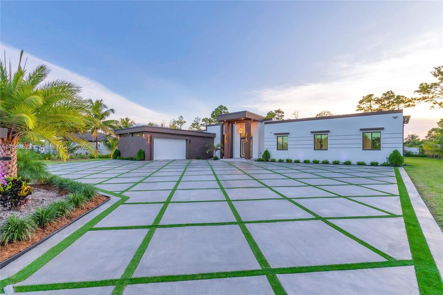Front exterior of a new home in , Homestead, FL, highlighting curb appeal (Image 28).
