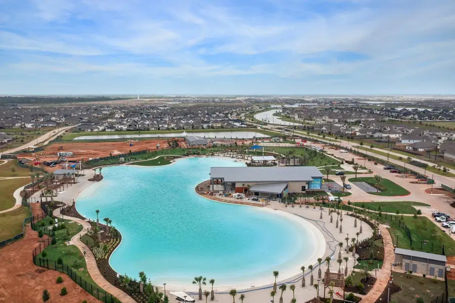 The star feature of The Sol Club is a Crystal Lagoons® amenity where people can walk along white-sand beaches, swim, kayak and paddleboard on turquoise blue waters — it’s a tropical vacation that can be yours when you live in Sunterra! Surrounding the lagoon is The Sol Club amenity village offering even more ways to play The star feature of The Sol Club is a Crystal Lagoons® amenity where people can walk along white-sand beaches, swim, kayak and paddleboard on turquoise blue waters — it’s a tropical vacation that can be yours when you live in Sunterra! Surrounding the lagoon is The Sol Club amenity village offering even more ways to play