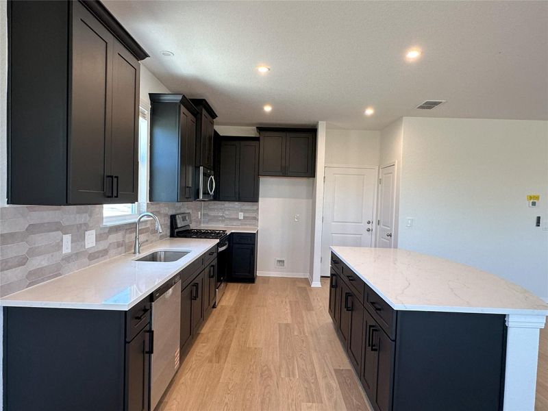 Furnished interior view inside a new home in Porter Country, Buda (Image 10).