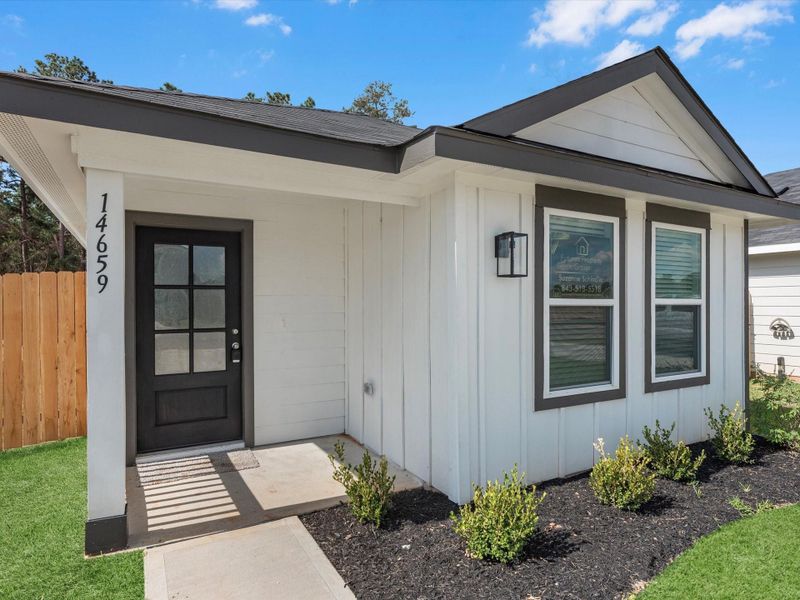 Exterior details and patio area of a home in William Trails, Willis (Image 20).