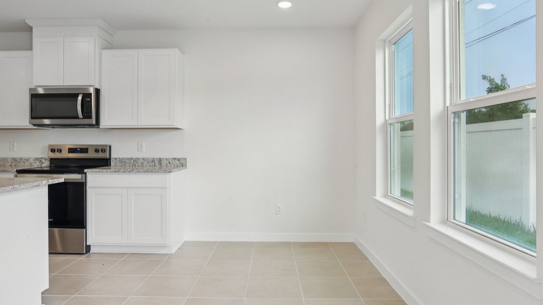 Kitchen of the Coronado - End at Cyrene at Harmony located in St Cloud FL by DRB Homes