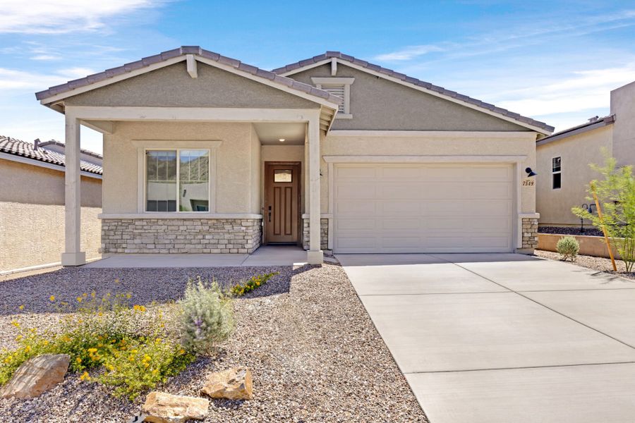 Front exterior of a new home in Saguaro Reserve II, Marana, AZ, highlighting curb appeal (Image 1). Front exterior of a new home in Saguaro Reserve II, Marana, AZ, highlighting curb appeal (Image 1).
