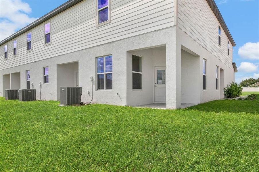Exterior details and patio area of a home in Sol Vista, Dundee (Image 3). Exterior details and patio area of a home in Sol Vista, Dundee (Image 3).