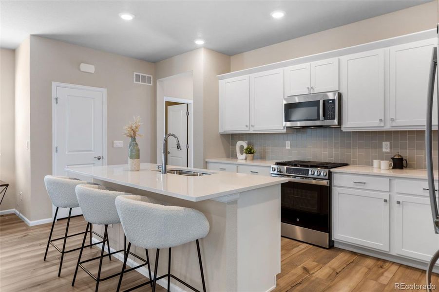 Furnished interior view inside a new home in Woodrose at Painted Prairie, Aurora (Image 33). Furnished interior view inside a new home in Woodrose at Painted Prairie, Aurora (Image 33).