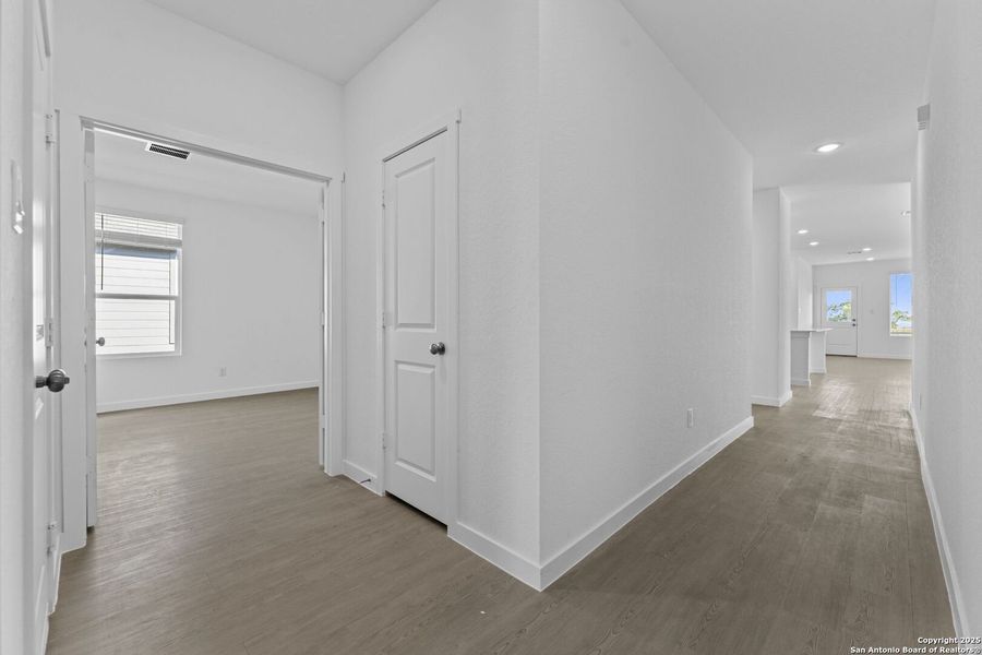 Spacious, unfurnished interior of a new home in Waterwheel: Coastline Collection, San Antonio (Image 23).