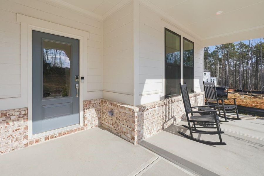 Exterior details and patio area of a home in Reserve at Hickory Walk, Kennesaw (Image 24). Exterior details and patio area of a home in Reserve at Hickory Walk, Kennesaw (Image 24).