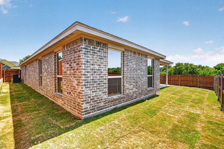 Exterior details and patio area of a home in Trail Creek, Cleburne (Image 28).