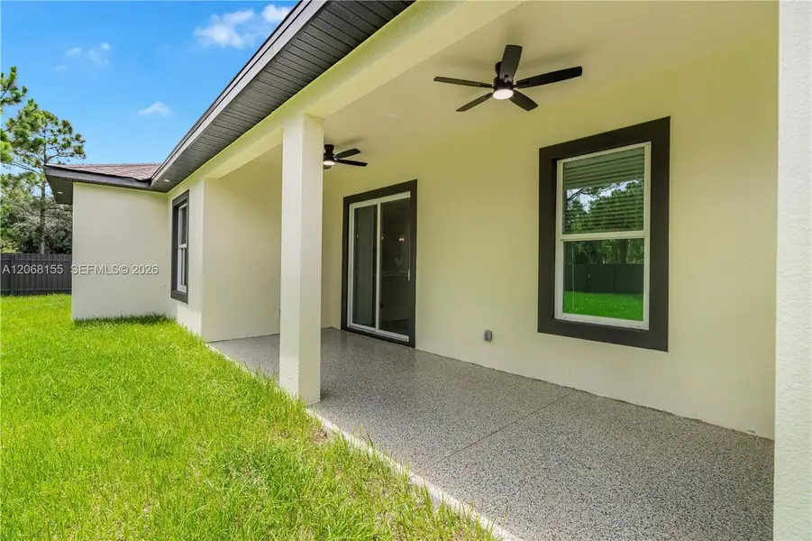 Exterior details and patio area of a home in , Lehigh Acres (Image 25). Exterior details and patio area of a home in , Lehigh Acres (Image 25).