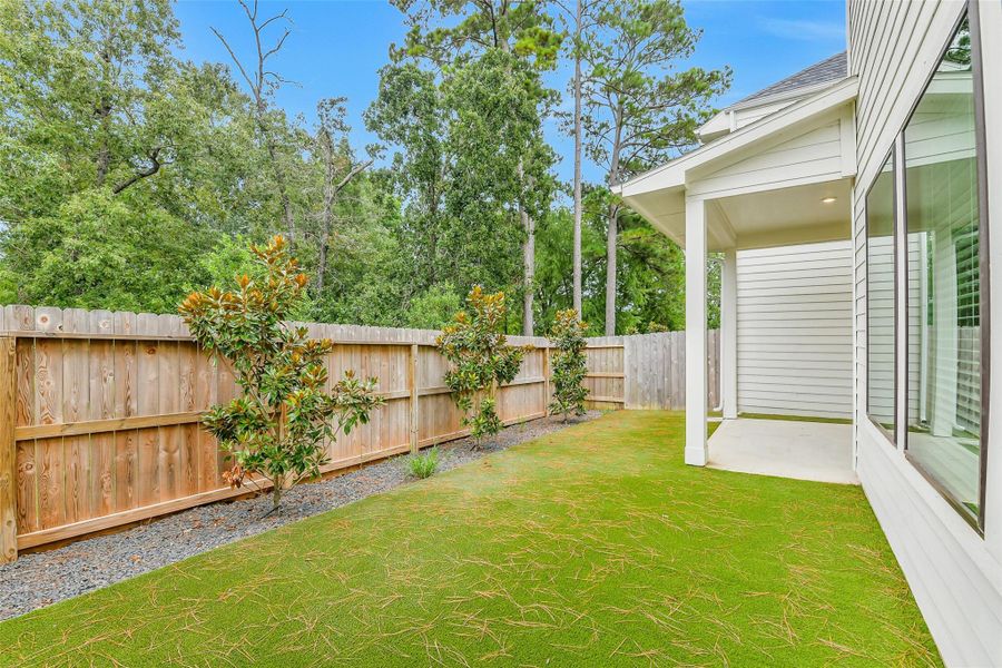 Exterior details and patio area of a home in Summer Place  35', Montgomery (Image 32).