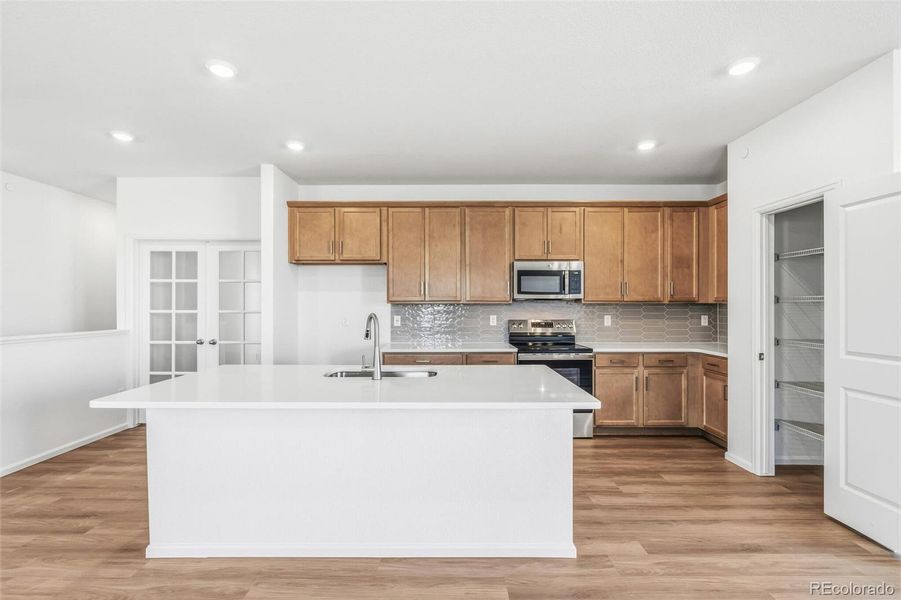 Furnished interior view inside a new home in Legato, Commerce City (Image 7).