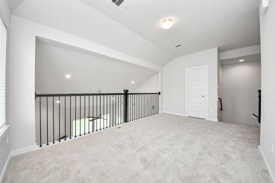 Take another look at this spacious game room area. Sample photo of completed home with similar floor plan. Actual colors and selections may vary.