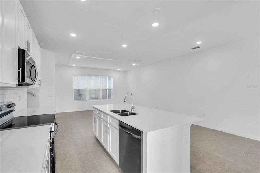 Furnished interior view inside a new home in The Residences at Emerson Park, Apopka (Image 7).