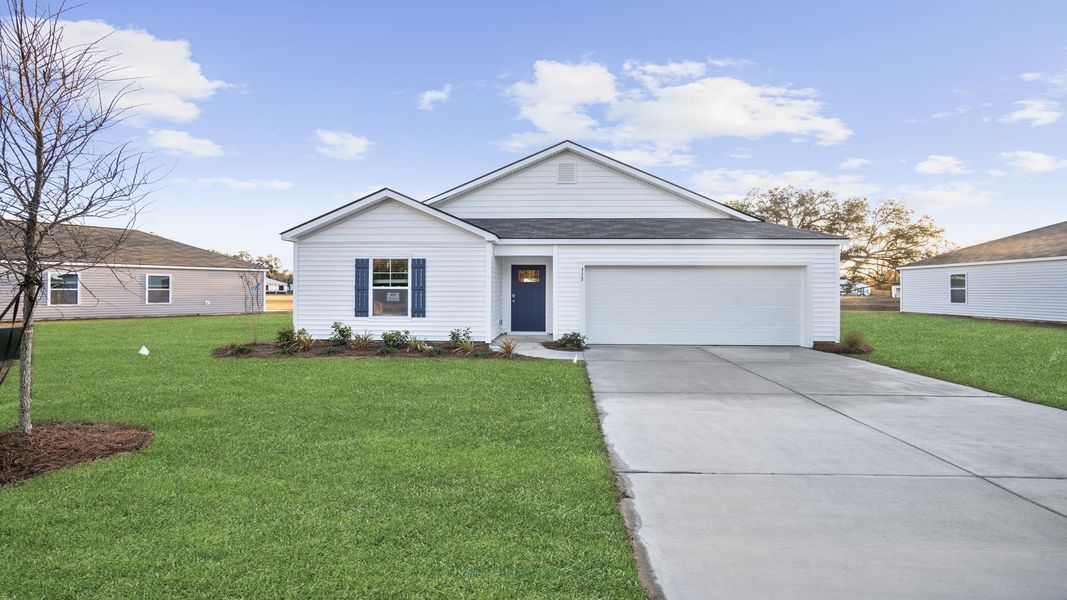 Representative exterior photo of a completed home built from the Kerry by D.R. Horton in Rice Hope, Port Wentworth, GA (Image 1).