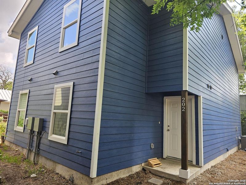 Front exterior of a new home in , San Antonio, TX, highlighting curb appeal (Image 11).