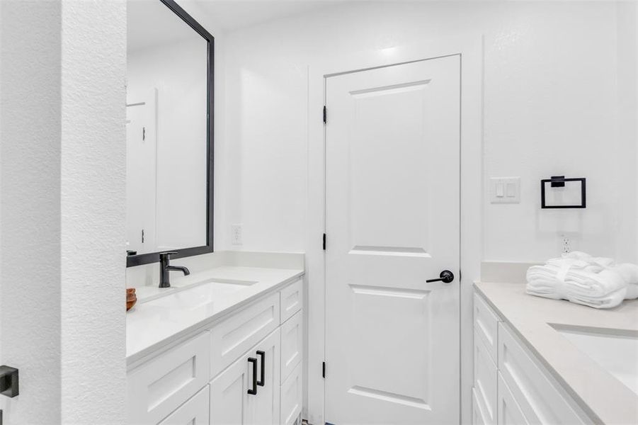 Bathroom featuring vanity
