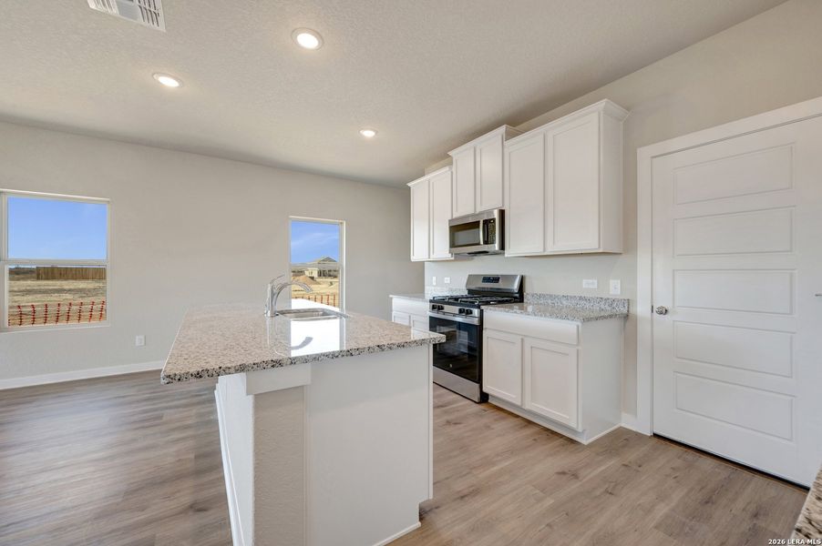 Furnished interior view inside a new home in Winding Brook, San Antonio (Image 13).
