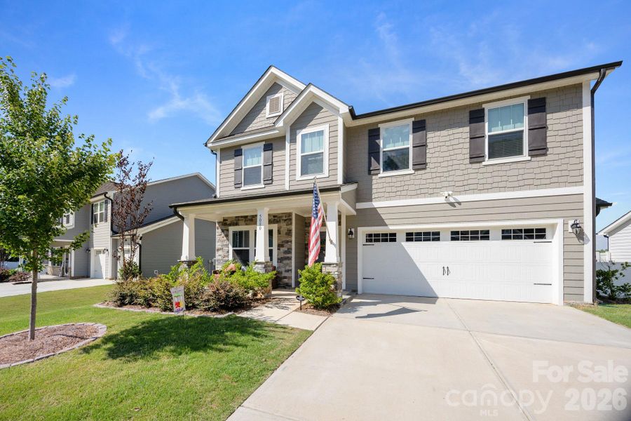 Front exterior of a new home in , Mount Holly, NC, highlighting curb appeal (Image 25).