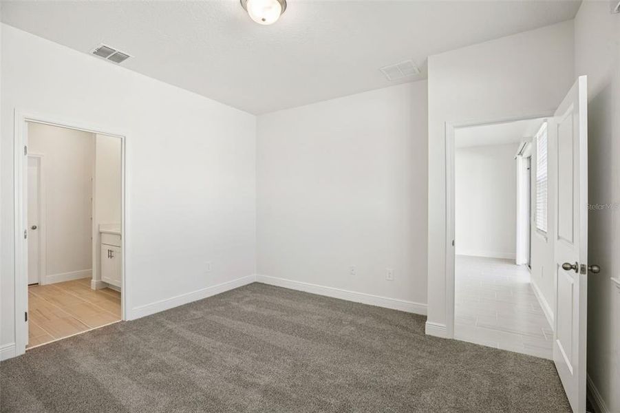 Spacious, unfurnished interior of a new home in Cyrene at Minneola - Villas, Minneola (Image 35).