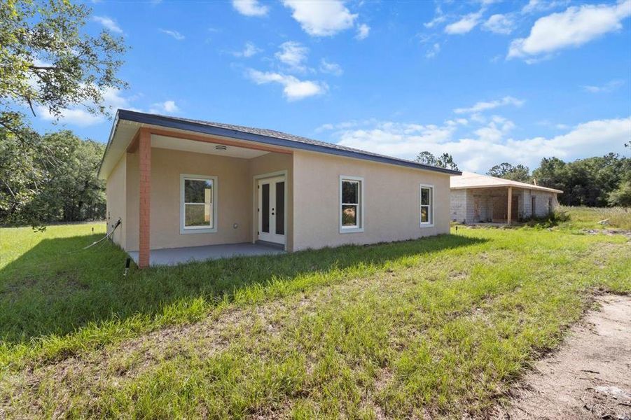 Exterior details and patio area of a home in , Citrus Springs (Image 21).