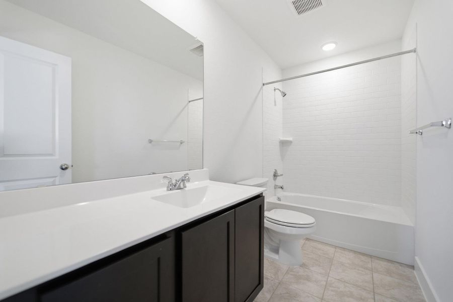 Furnished interior view inside a new home in Grande Estates, Bertram (Image 8).