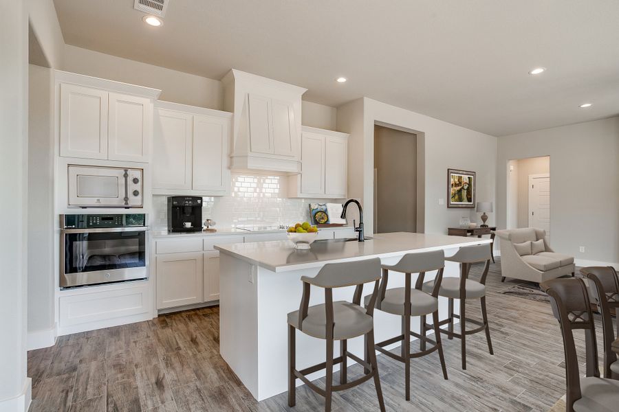 Representative furnished interior of a home built from the The Tulip by Kenmark Homes in Zion Valley, Poolville (Image 6).
