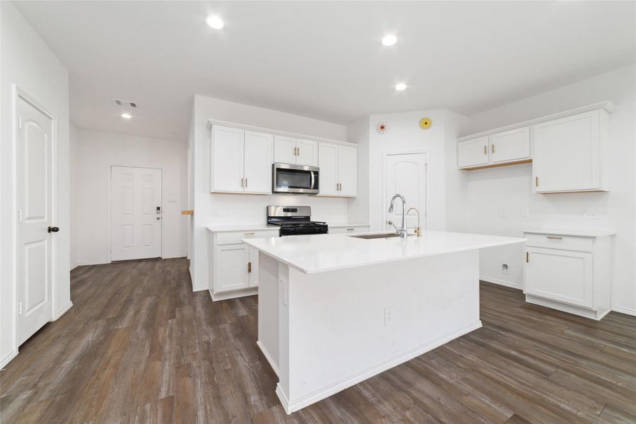 Furnished interior view inside a new home in Sunterra, Katy (Image 8).