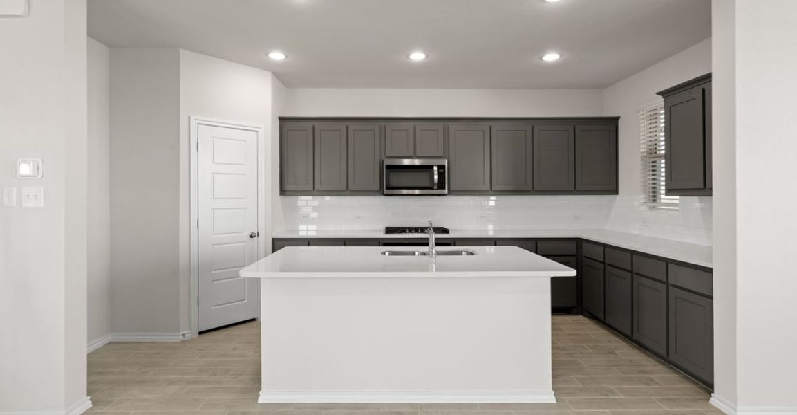 Representative exterior photo of a completed home built from the Caddo by Impression Homes in Creekshaw, Royse City, TX (Image 8).