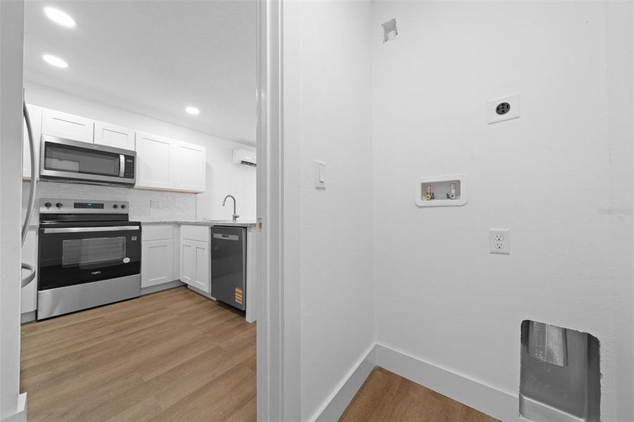 Laundry Room off of the Kitchen