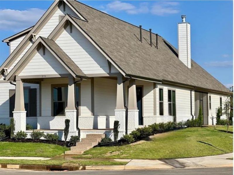Front exterior of a new home in Twin Oaks, Oakland, TN, highlighting curb appeal (Image 2).