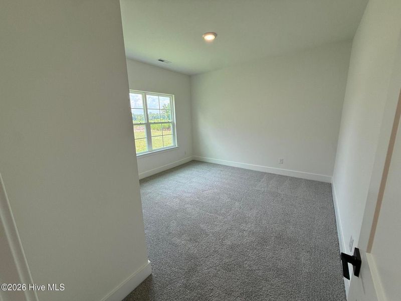 Spacious, unfurnished interior of a new home in Wood Creek Landing, Leland (Image 39). Spacious, unfurnished interior of a new home in Wood Creek Landing, Leland (Image 39).