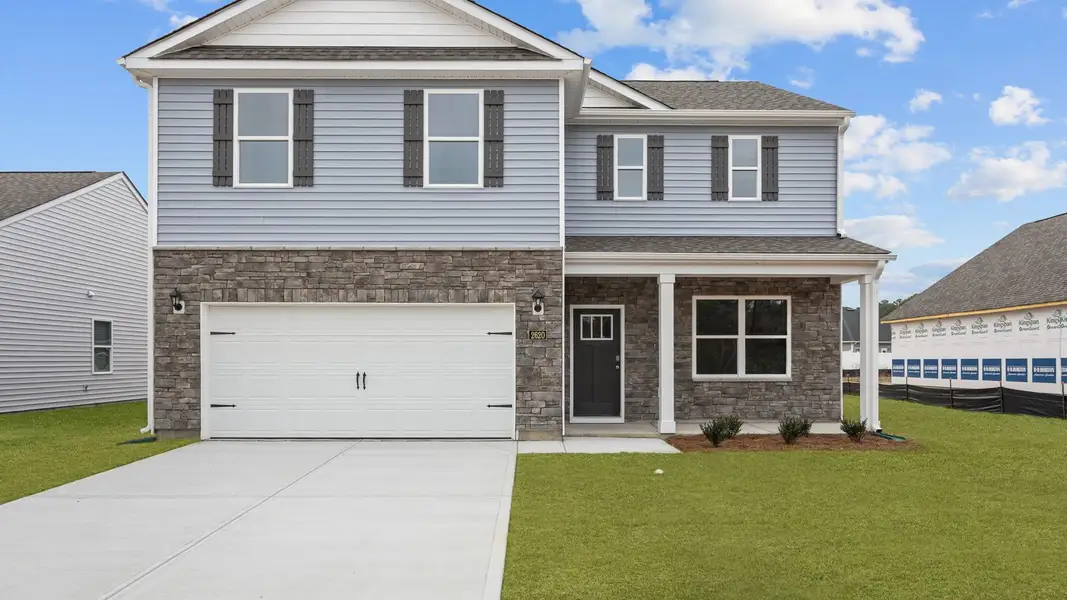 Front exterior of a new home in Villa Grande, Winterville, NC, highlighting curb appeal (Image 1).