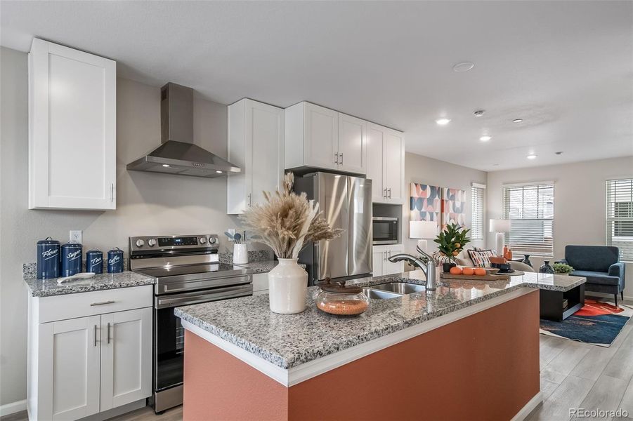 Furnished interior view inside a new home in Reunion, Commerce City (Image 13).