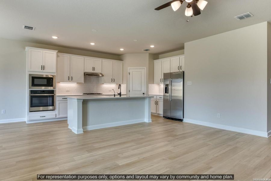 Furnished interior view inside a new home in Hennersby Hollow, San Antonio (Image 9).