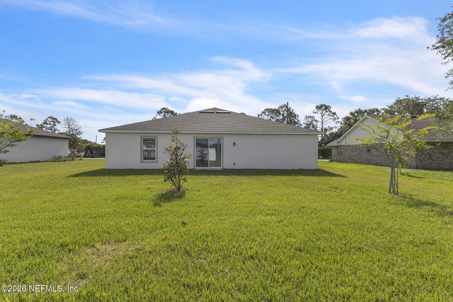 Exterior details and patio area of a home in Palm Coast, Palm Coast (Image 4).