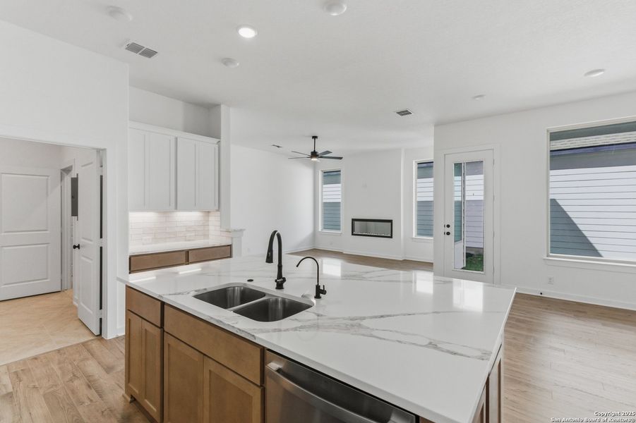 Furnished interior view inside a new home in The Crossvine – Garden Homes, Schertz (Image 7).
