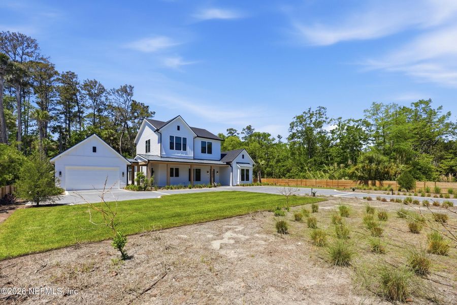 Front exterior of a new home in , Ponte Vedra Beach, FL, highlighting curb appeal (Image 31).