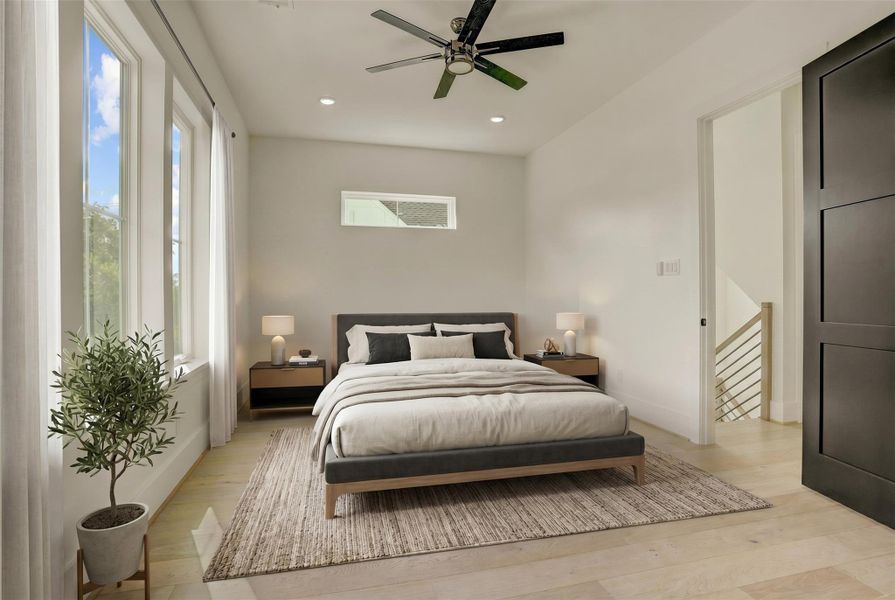 The third-floor guest suite sits opposite the primary and offers a sizable bedroom, large walk-in closet, and ensuite bathroom. Virtually staged photo. The third-floor guest suite sits opposite the primary and offers a sizable bedroom, large walk-in closet, and ensuite bathroom. Virtually staged photo.