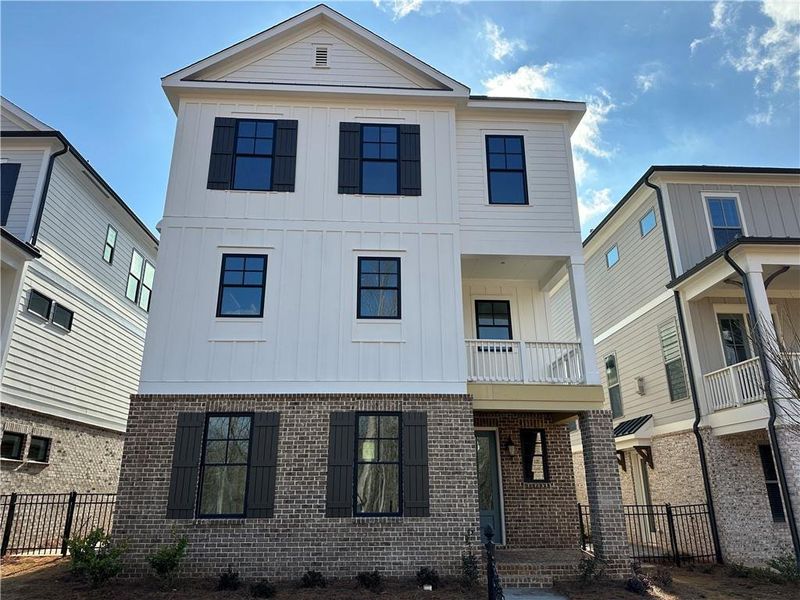 Front exterior of a new home in Waterside Single Family, Peachtree Corners, GA, highlighting curb appeal (Image 21).